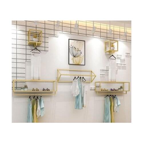 Clothing store display rack wall womens shop wall hanging hangers gold clothing rack side hanging combination