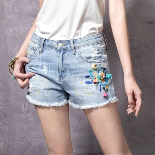 ARTKA Summer Women Cotton Denim Shorts Elastic Floral Printed Pocket Pattern Holes Design Female Blue Jeans Shorts KN11072X