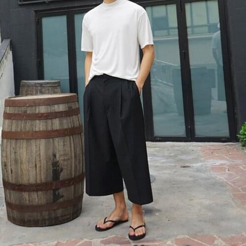 Korean version of the trendy mens autumn and winter new casual pants wide leg pants skirt pants fashion pleated solid color loo