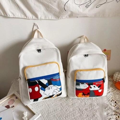 Disney Mickey school bag boys and girls large capacity canvas travel bag junior high school students leisure sports school bag