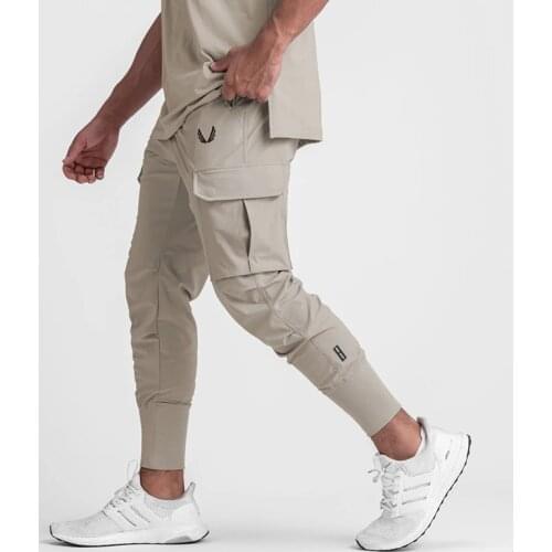 Drawstring Pockets Track Pants 2021 Streetwear Summer Sports Elastic Jogging Trousers Casual Men Fashion Slim Pencil Pants Mens