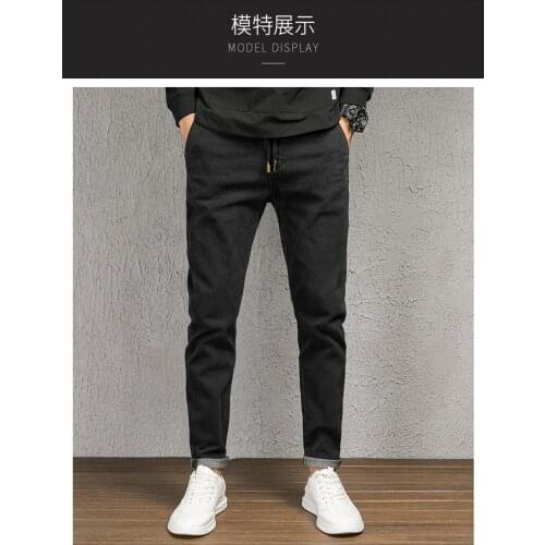 Free shipping 2019 autumn and winter mens tether feet jeans classic high-end comfortable jeans