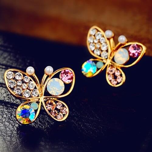 Korean version of the lovely romantic butterfly hollow imitation pearl Crystal earrings for women female E505