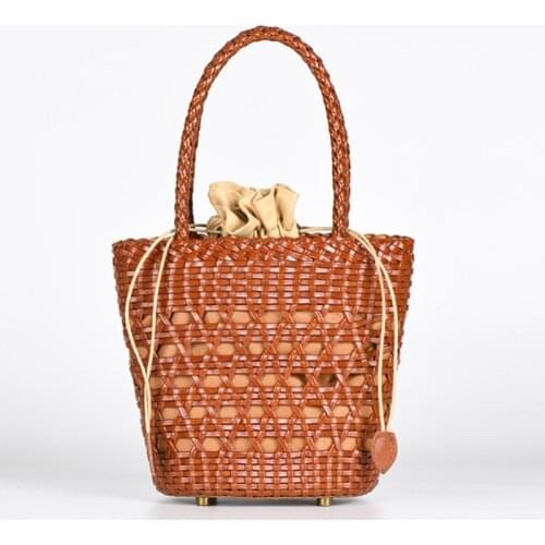 2021 spring and summer new hand-woven bag hollow vegetable basket leather handbag beach bag