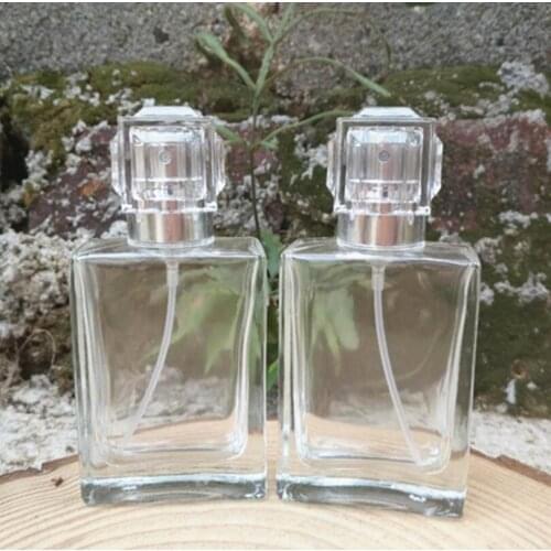 Wholesale 30ML clear square glass perfume bottle cosmetic dispensing nozzle spray bottles LX1054