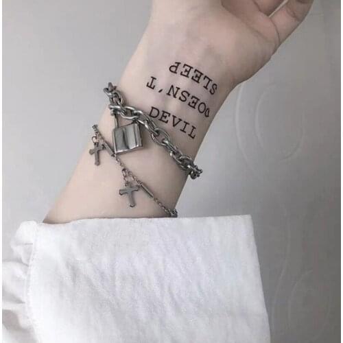 Charm bracelet with Cool hip-hop dark wind couple bungee titanium steel cross bracelet chain for men and women wholesale