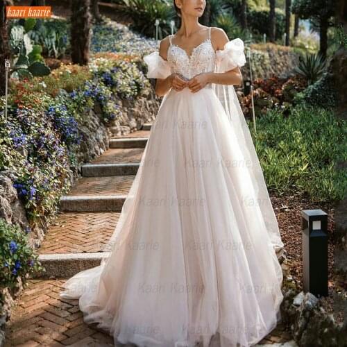 Elegant Princess Wedding Dresses White 2021 A Line Robe De Mariée Backless Appliques Abito Da Sposa Spaghetti Strap Bridal Gowns