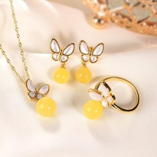 S925 sterling silver gold-plated natural amber light luxury temperament butterfly womens ear studs ring pendant suit