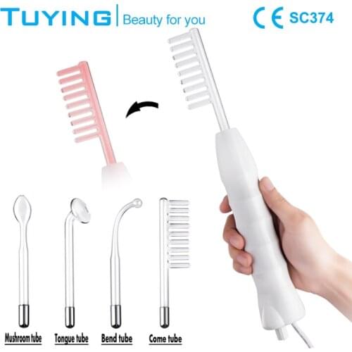 Holding a high frequency ozone therapeutic apparatus red light portable 4 in 1 body massager