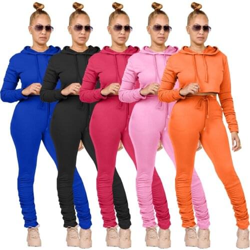 Europe and the United States spring and autumn womens long-sleeved solid color sweater pleated insert pocket hoodie sports suit