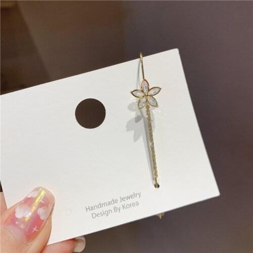 ALLNEWME Single Piece Korean Shinning CZ Stone Flower Tassel Earrings for Women Girls Brass Gold Floral Clip Earrings Brincos
