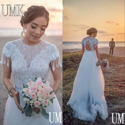 UMK Bohemia Tassel Lace Wedding Dress 2021 Sexy Open Back Short Sleeve Beach Boho Bridal Gowns