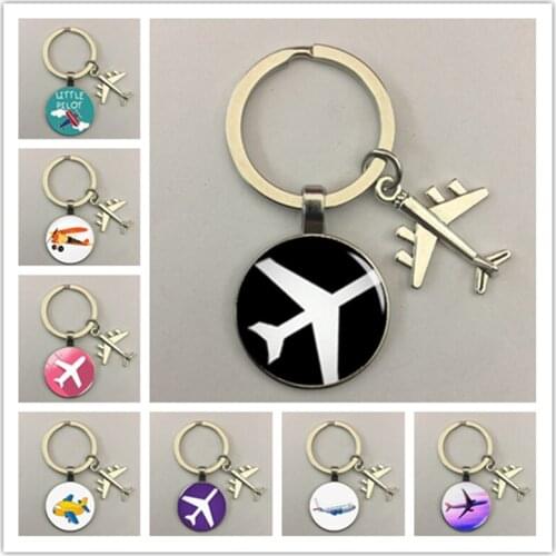 Creative cartoon airplane pendant keychain gift cartoon airplane keychain travel exploration glass dome travel party souvenir
