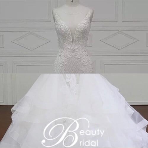 Luxury Mermaid Wedding Dresses 2019 With float and Lace Customize Lace Up Back Bridal Gown Train Vestidos De Noiva