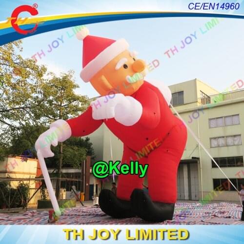 10m 33ft high giant inflatable santa claus for sale, custom made big santa climb wall, big inflatable santa walk on crutches