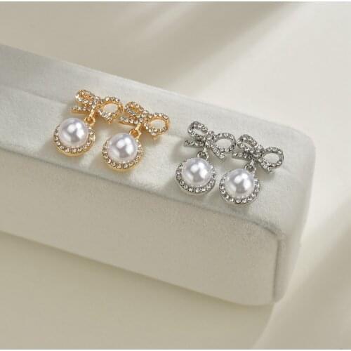 UAM 2021 Spring Bowknot Shape Rhinestones Imitation Pearl Animal Drop Earrings Women Fashion Classic Jewelry Earrings Wholesale