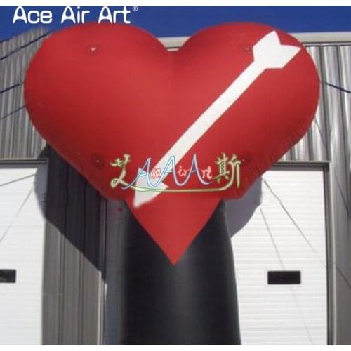 Huge red inflatable red HEART with Cupids Sword for event and party in Valentines day
