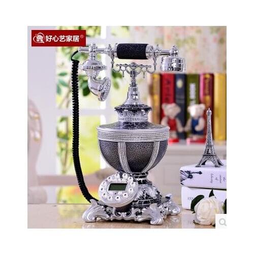 Antique telephone The ancient antiques here sitting in the living room telephone machine anti thunder telephone nostalgic