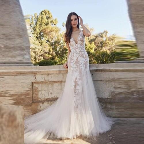 On Sale Charming Lace Backless Bridal Wedding Gowns Sleeveless Mermaid Deep V Neck Wedding Dresses for Bride Appliqued 2020