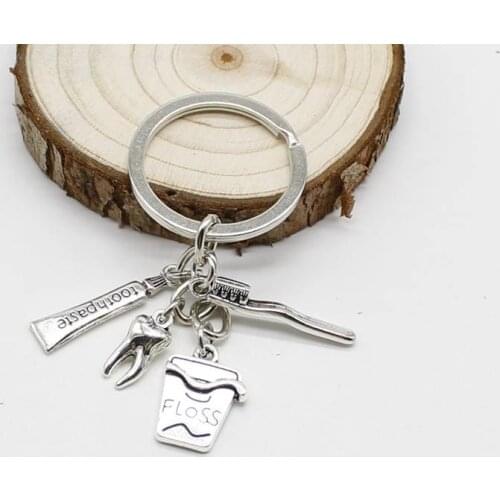 1 toothbrush tooth toothpaste maintenance hygiene dental keychain decoration key chain backpack pendant keychain