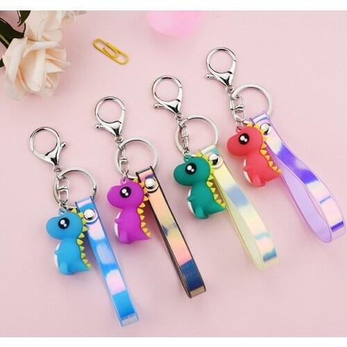 Creative cartoon soft plastic dinosaur doll key chain magic color stripe leather rope lovers bag small gifts pendant wholesale