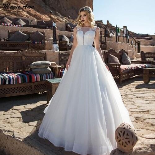 Magic Awn 2021 Bohemian Wedding Dresses Shiny Lace Appliques Princess Country Bridal Gowns Open Back A-Line Robe De Mariage
