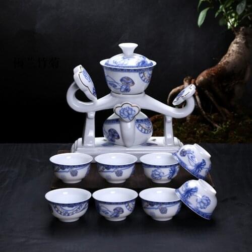 Dehua Kung Fu Tea Set New RuYi Porcelain Cups Automatic White Ceramic Hollow Transparent Blue and White Tea Pot mouth Cup