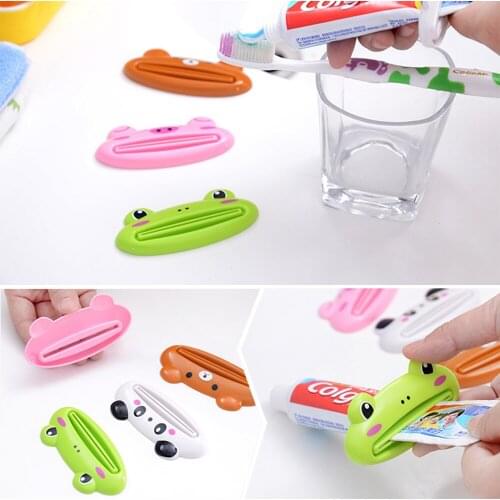 1pcs Kids Children Toothpaste Dispenser Tools Cartoon Tooth Paste Tube Squeezer Toothpaste Rolling Holder Home Bathroom Supplies