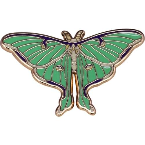 Luna Moth Brooch see its beautiful lime-green colored wings and white body