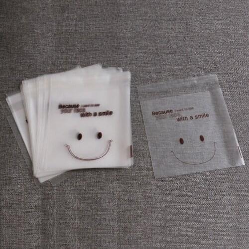 100pcs/set Transparent Smiling Face Pattern Design Self Adhesive Seal Bakery Bread Plastic Bag