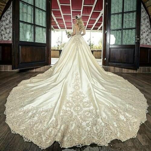 Long Sleeve Luxury Wedding Dresses 2020 Heavy Beaded Crystal Lace Edge Arabic Dubai Muslim Champagne Church Bride Dress Robe De