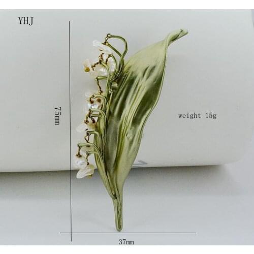Ornaments Lily shaped natural pearls spray, leaves, shell, female Brooches