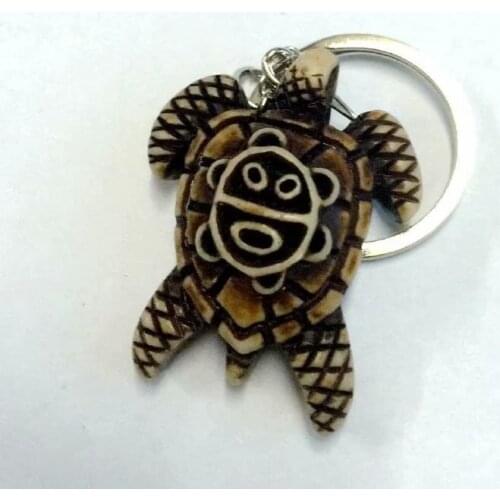 Alert ! 12pcs Imitation Yak Bone Carving Tribal Sun Smiley Turtle Charm Keychain
