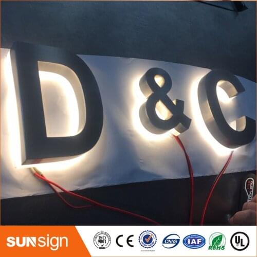 Brushed metal outdoor backlit letters