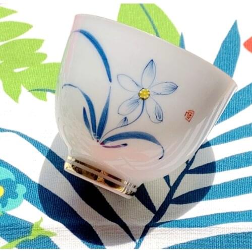 4Pcs/set Orchid Hand-Painted Tea Set Under Glaze Color Porcelain Teacups White Porcelain Kung Fu Tea Cups