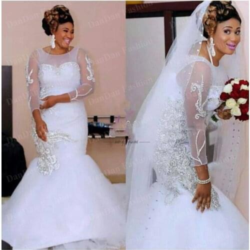 African Glamorous Mermaid Wedding Dresses Tulles Long Sleeves Sequins Beaded Sheer Jewel Court Train Bridal gowns plus size 2020