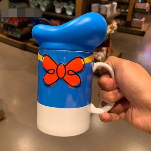 New style Shanghai Disney cartoon three-dimensional Donald Duck ceramic mug with lid decoration gift AG2629