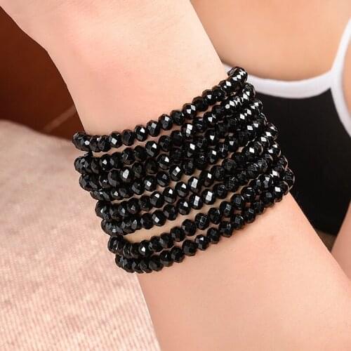 The black bracelet is shiny ,DIY can be made freely different 4*6 mm black glass bracelet