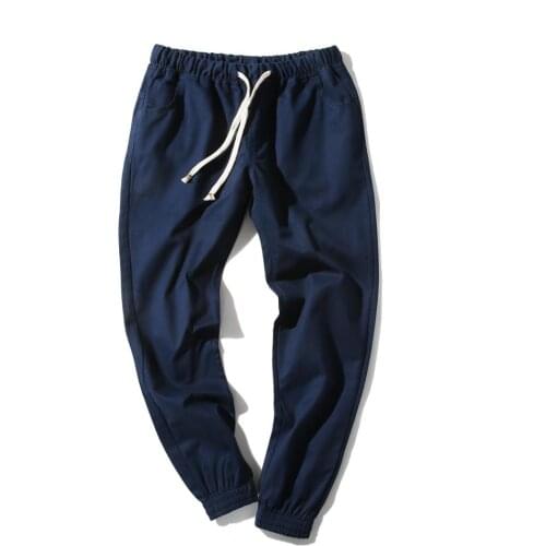 Wholesale Spring summer Korean solid color harem pants male youth ankle length sweatpants fashion beam pants elastic trousers