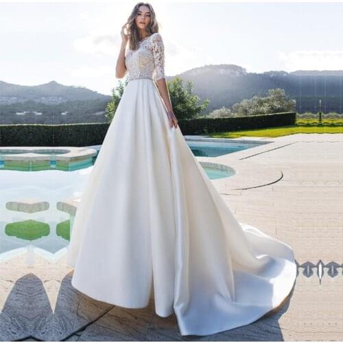 Princes Turkey Wedding Dresses Half Sleeves Appliques Lace Illusion Back Bridal Dress vestidos de noiva Wedding Gown with Pocket