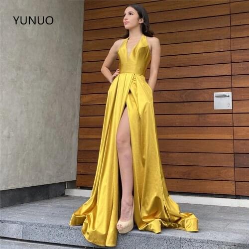 YUNUO Halter Sleeveless Gold Prom Dresses Long Slit A Line Party Evening Dress With Pockets vestidos de fiesta Sweep Train