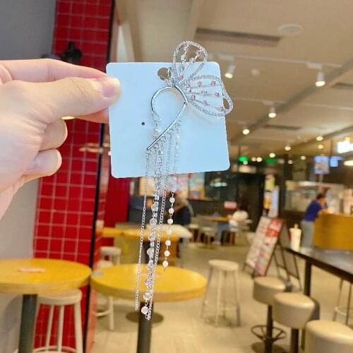 Pearl butterfly fairy earrings without pierced ears 2021 new trend Su earrings female design sense niche hanging ears