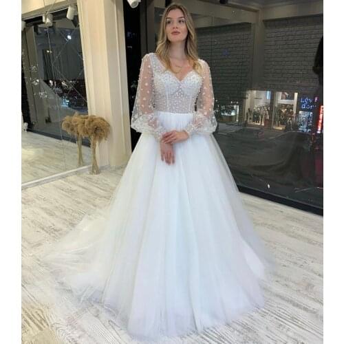 Wedding Dress A-Line V-Neck Illusion Lantern Sleeve Backless Lace Appliques Sequined Beads Floor Length Sweep Train Bride Gown