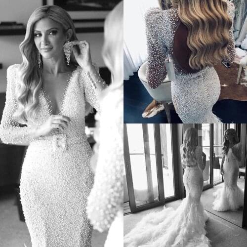 Luxury Full Pearls Mermaid Wedding Dresses 2021 Long Sleeves Open Back Bridal Gowns with Feathers Sweep Train Wedding Dress