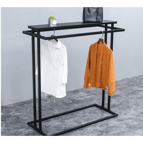 A display rack in the middle island shelf. Double row middle shelf. Parallel bars side hangers iron clothes hanger..062