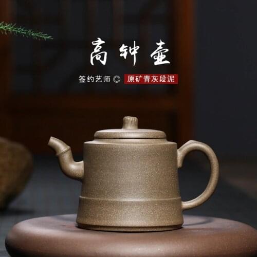 Bell purple sand teapot Dezhong wholesale blue grey section mud tennis hole teapot with household one-piece delivery