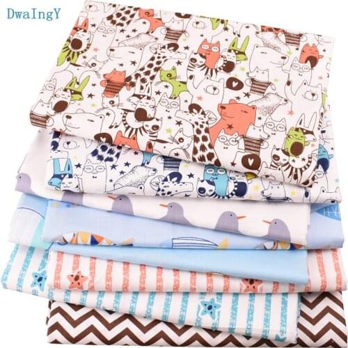 DwaIngY 8pcs/lot Cartoon series Twill Cotton Fabric For Patchwork Cloth DIY,Sewing,Quilting,Quarters,Material Baby Doll 40*50cm