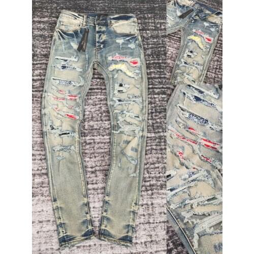 Men art patches heavy distressed jeans