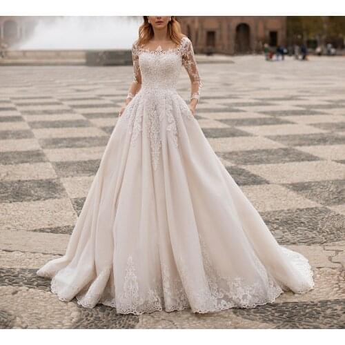 Elegant Long Sleeve Mermaid Lace Wedding Dresses Ivory Button Back Tulle O-Neck Robes De Mariée Bridal Gown For Women