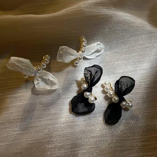 Korean fashion jewelry Baroque imitation pearl bow earrings with lovely temperament and new earrings for women